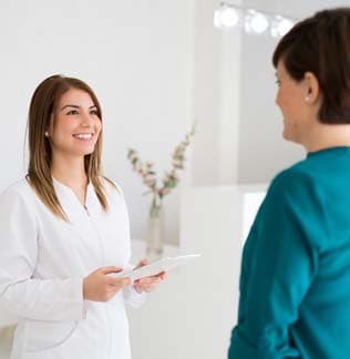 Medical staff checking in a patient