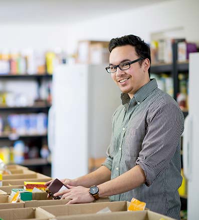 Man Volunteering at the Food Bank