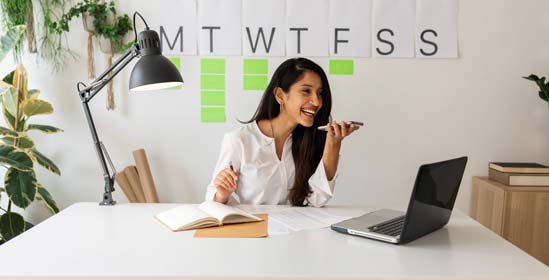 Woman talking on her phone in an office