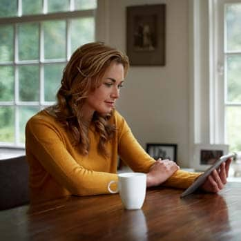 Woman using digital tablet