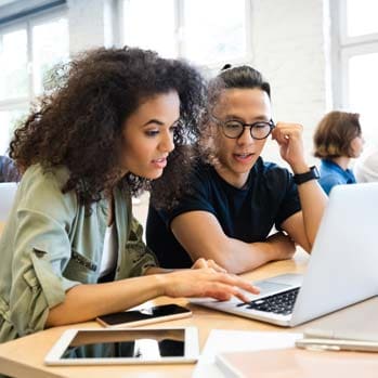 Classmates are learning through laptop