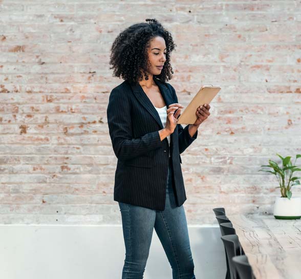 Businesswoman working on mobile device