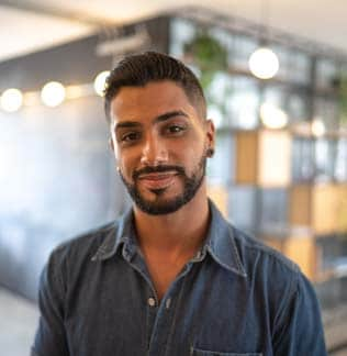 Latino man standing at work studio