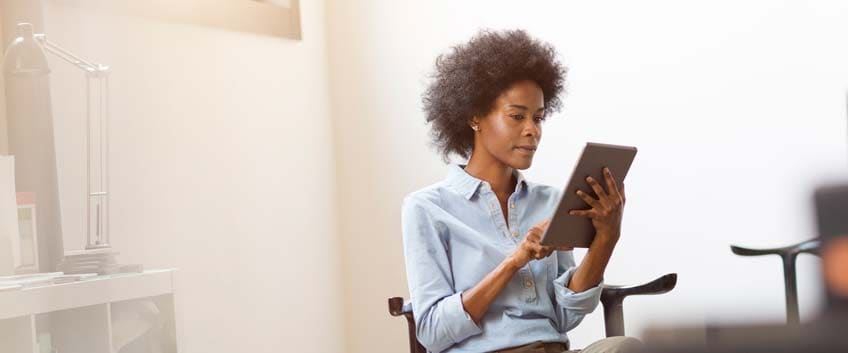 Businesswoman using digital tablet 