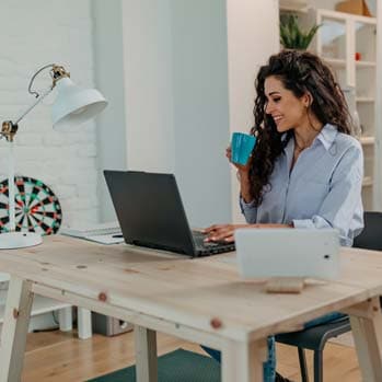 Businesswoman working from her home office.